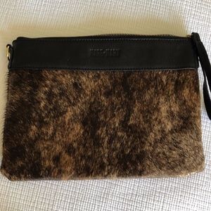 Leather and cow hide clutch